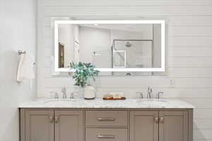 Full bathroom with double vanity