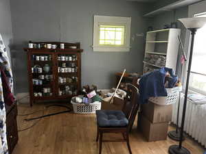 Dining space with light wood flooring