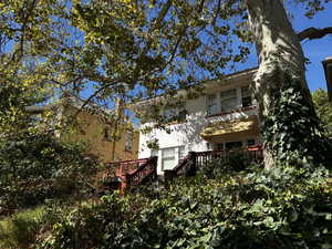 Front of property featuring a deck