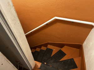 Stairs leading to basement from kitchen