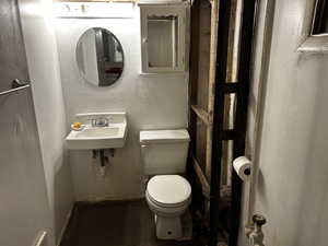 Bathroom with toilet and a sink