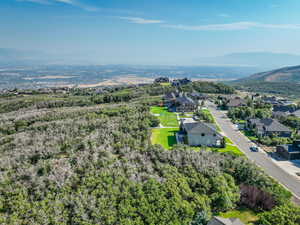 Aerial perspective of suburban area with mountains