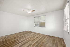 Unfurnished bedroom featuring light wood-style flooring and ceiling fan