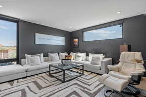 Cinema featuring recessed lighting and carpet floors