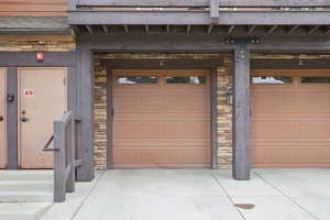 Garage with concrete driveway
