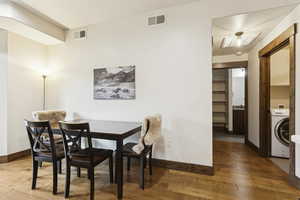 Dining space featuring hardwood / wood-style flooring and washer / clothes dryer