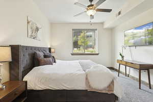 Bedroom featuring carpet floors and a ceiling fan