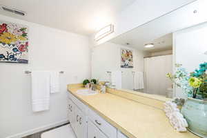 Full bath with vanity and toilet