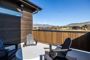 View of patio featuring a residential view and a mountain view