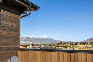 View of mountain background featuring nearby suburban area