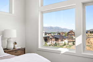 Bedroom with a mountain view and a residential view
