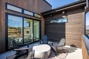 View of patio / terrace featuring a water view