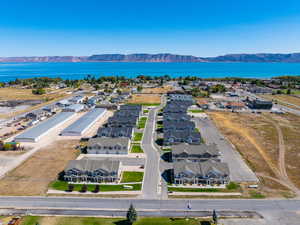 Aerial view of residential area featuring a water and mountain view