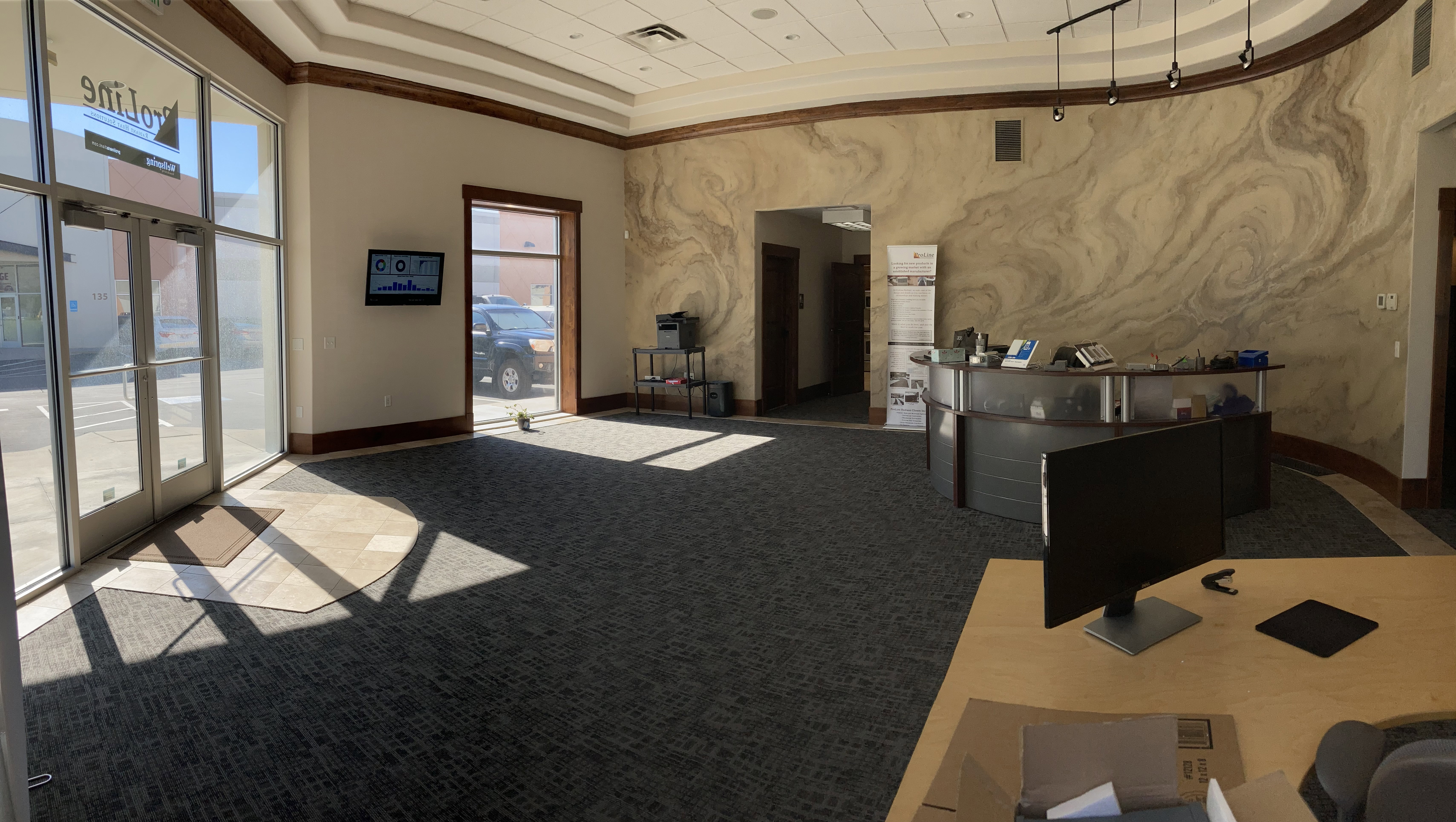 Reception area featuring a towering ceiling