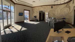 Reception area featuring a towering ceiling