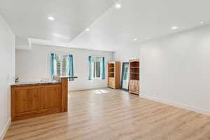 Empty room featuring recessed lighting and light wood finished floors