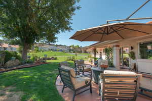 View of patio with a residential view and an outdoor hangout area