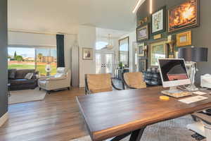 Office space with french doors and wood finished floors