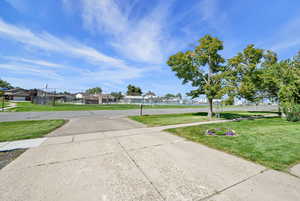 Home is located across from HOA community pool and sports courts