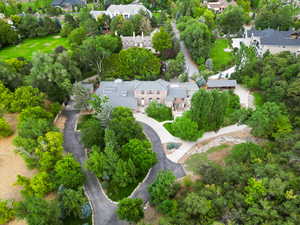 Aerial view of property's location with nearby suburban area