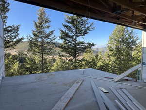 Construction update: Exterior view of a mountainous background from one of the 4 outdoor decks and balaconies.