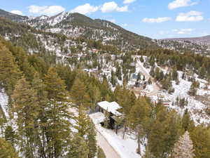 Snowy aerial view with a mountain view