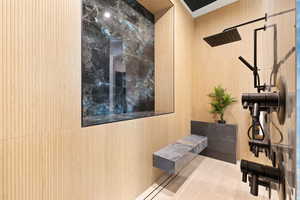 Bathroom with a tile shower