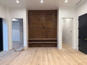 Bathroom featuring light wood-style floors and recessed lighting