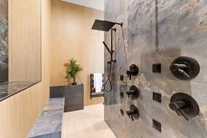 Bathroom with tiled shower