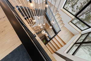 Stairway featuring a high ceiling