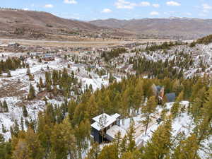 Snowy aerial view with a mountain view
