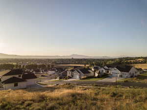 Aerial view of residential area featuring mountains