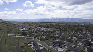 Aerial overview of property's location featuring nearby suburban area and a VIEW of the Wellsville Range.