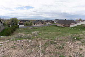View of yard with a residential view and a mountain view this view is looking to the WEST