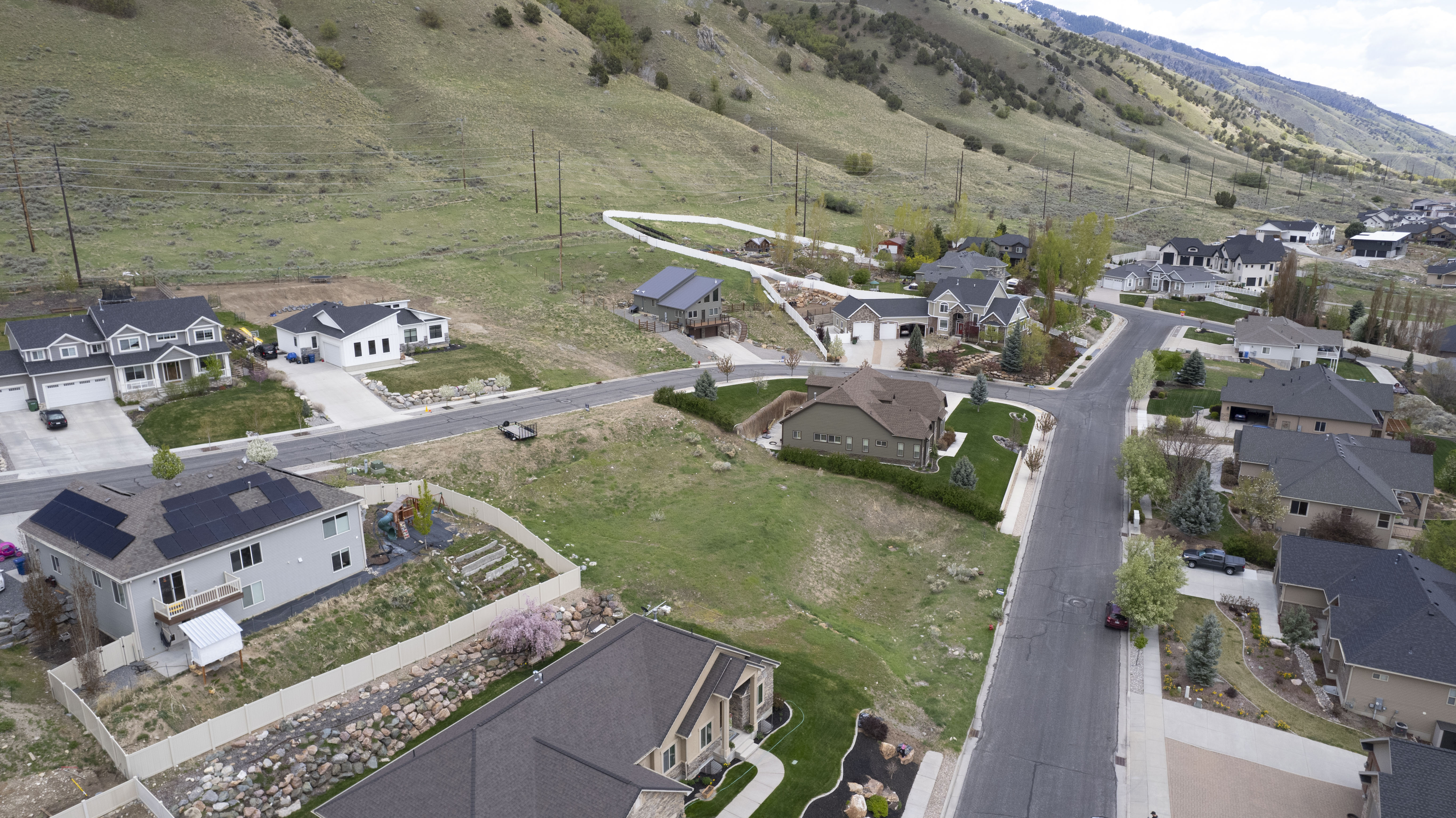 View of property location with nearby suburban area