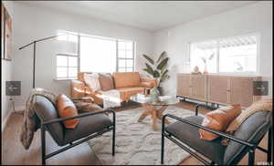 Living area with wood finished floors