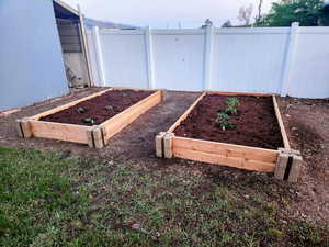 View of yard with a vegetable garden