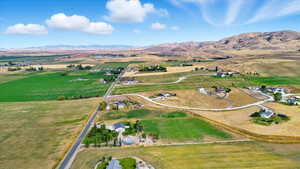 View of property location with mountains and rural landscape