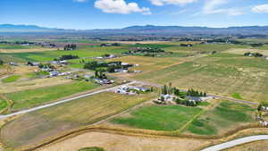 Overview of rural landscape with a mountainous background