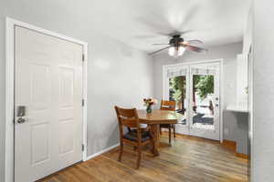 Dining room featuring light wood-style flooring and ceiling fan