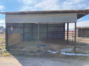 View of outbuilding featuring an exterior structure