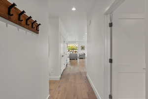 Hall featuring recessed lighting and light wood-style floors