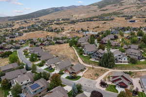 View of property location with nearby suburban area and mountains