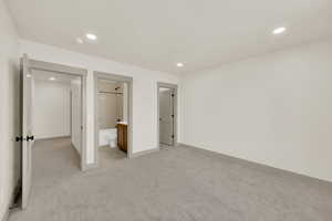Basement bedroom #2 with daylight window and ensuite bathroom.