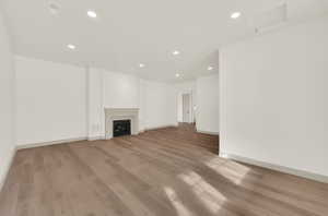 Large room with fireplace off the entry. Could be formal living room, music room, office or library.