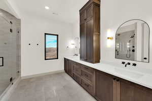 Master suite bathroom with double vanity.