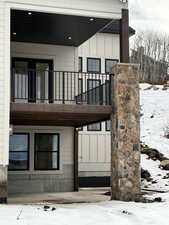 Covered deck and patio. Uncovered patio is hot tub ready.