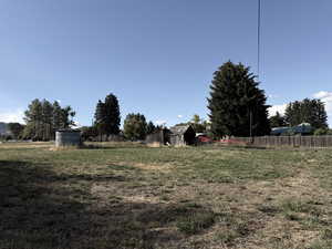 View of yard with an outbuilding
