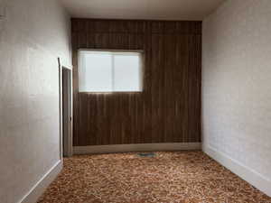 Empty room with baseboards