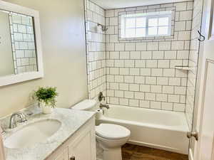 Full bathroom featuring  shower combination and vanity